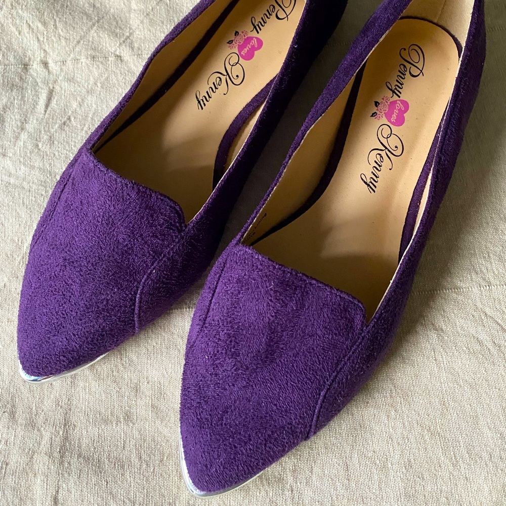 Purple flats with silver trim. NEW & NEVER WORN!